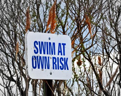 Wayfinding and Typographic Signs - swim-at-own-risk