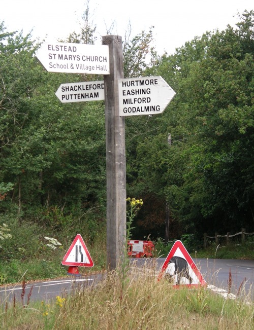 Wayfinding and Typographic Signs - village-and-road-work-signs