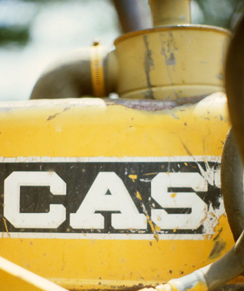 Chamfered Gothic lettering on a bulldozer.