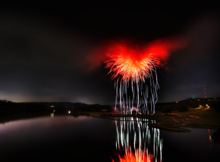 HDR Photos - Heart of Satan - What it looks like when fireworks explode inside of a storm cloud over a river