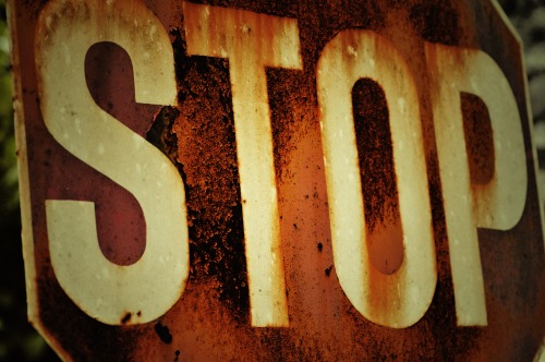 Wayfinding and Typographic Signs - rusty-stop-sign