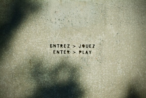 Wayfinding and Typographic Signs - enter-play-engraved-in-concrete