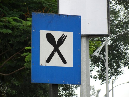 Wayfinding and Typographic Signs - yummy-food-just-few-metres-away