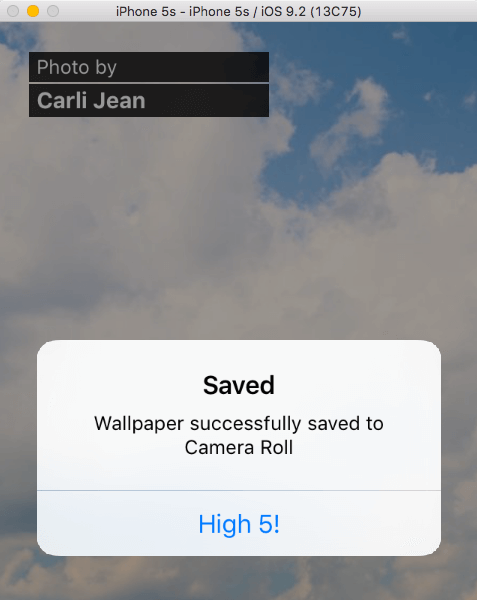 Alert modal pops up when wallpaper is successfully saved to the Camera Roll.