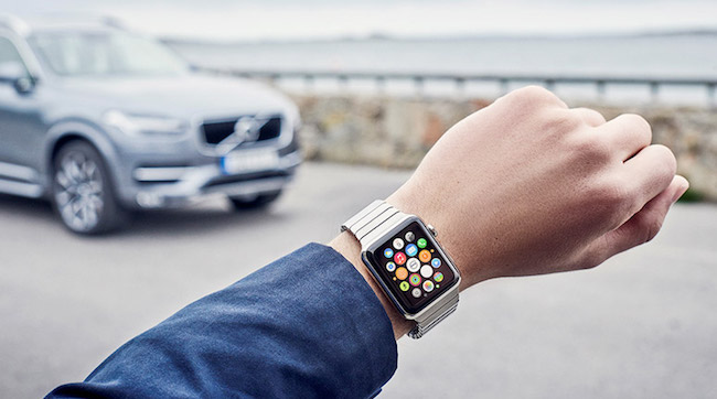 Apple watch on a wrist, helping someone find their car.