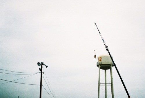 Wayfinding and Typographic Signs - q-mart-water-tower