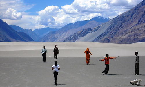 A Picture of a group of people on sand flats in the Himalayas