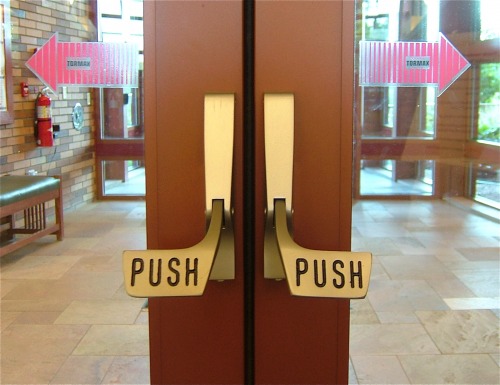 Wayfinding and Typographic Signs - push-automatic-door