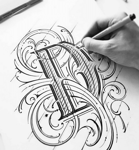 Mateusz Witczak working on a hand lettering