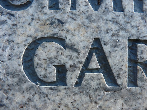 Uppercase “G” And “A” Carved In Granite