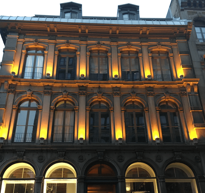Photo of an illuminated building.