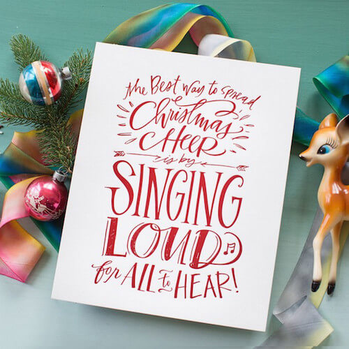 The best way to spread Christmas cheer is by singing loud for all to hear, hand letter by Lindsay Sherbondy