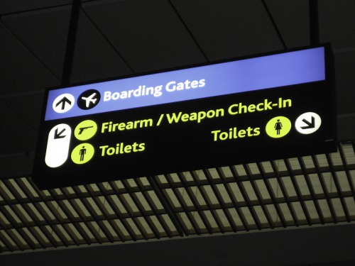 Wayfinding and Typographic Signs - johannesburg-airport-weapons-check-in