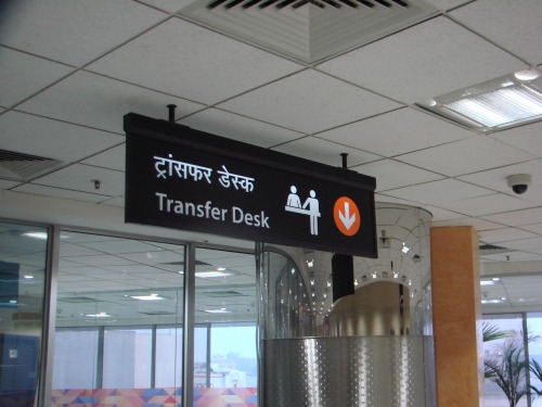 Wayfinding and Typographic Signs - airport-transfer-desk